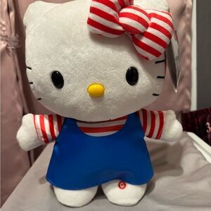 Hello Kitty Stepper in Striped Red and Blue Outfit plays music